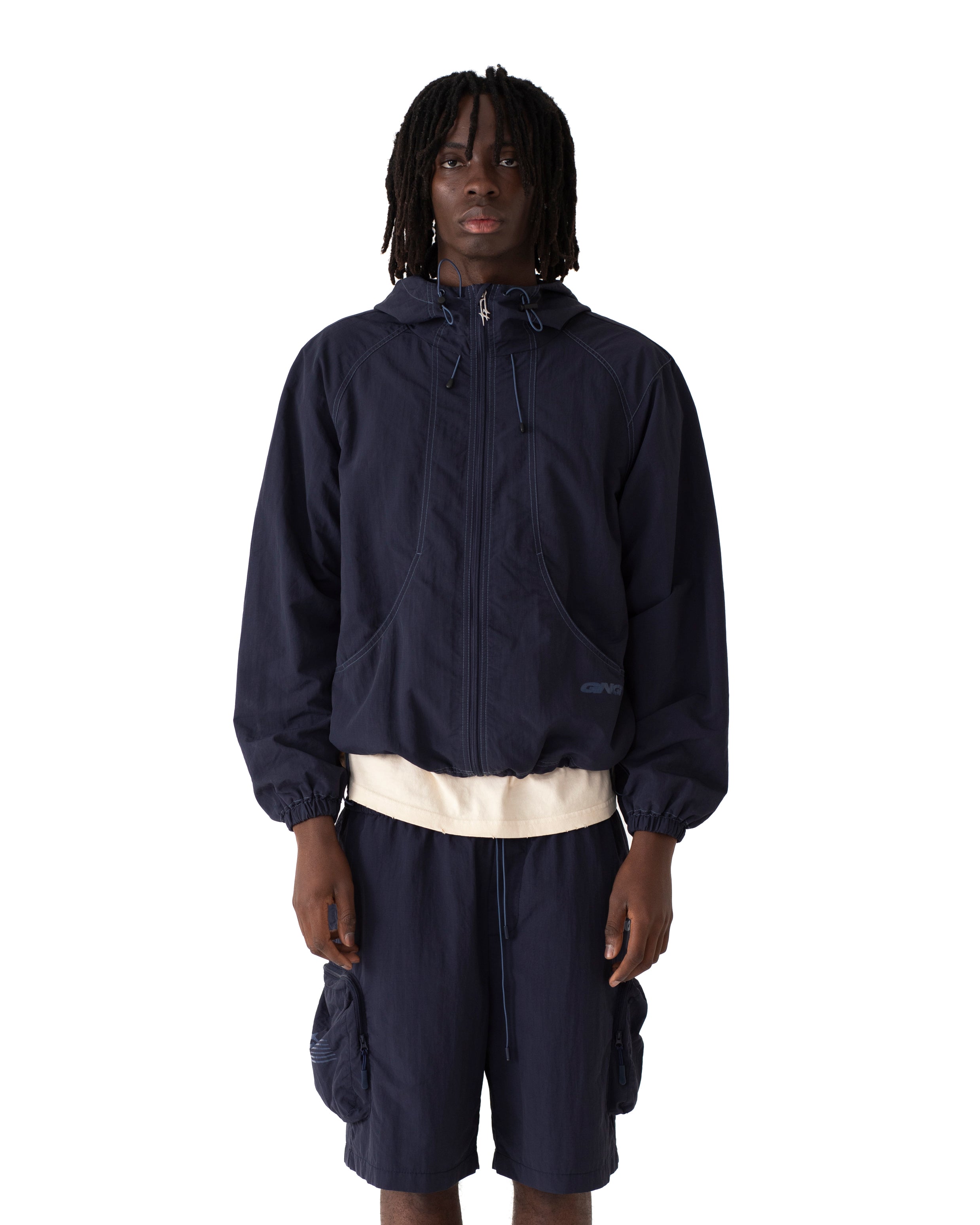MOTION SHELL JACKET WORN NAVY