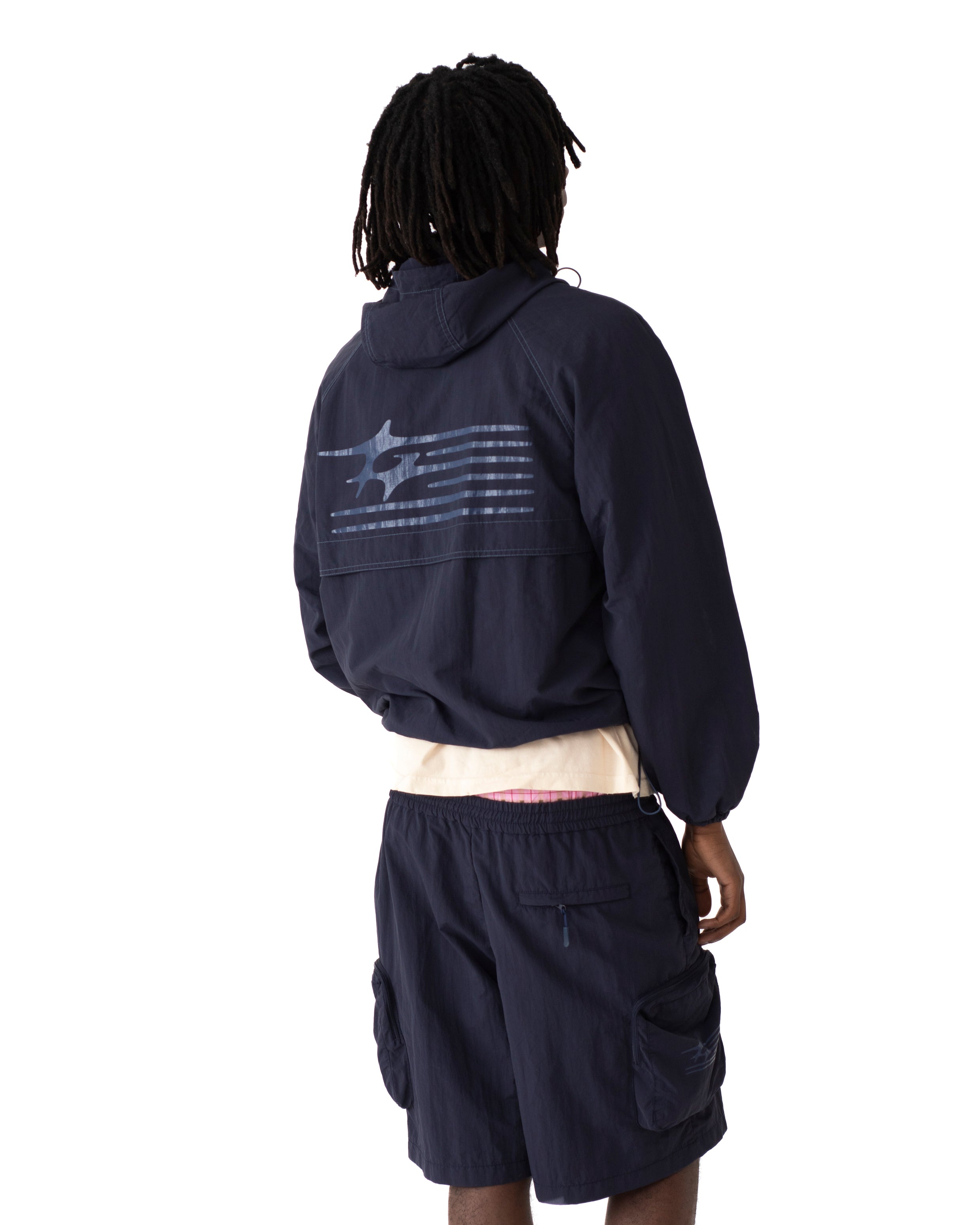 MOTION SHELL JACKET WORN NAVY